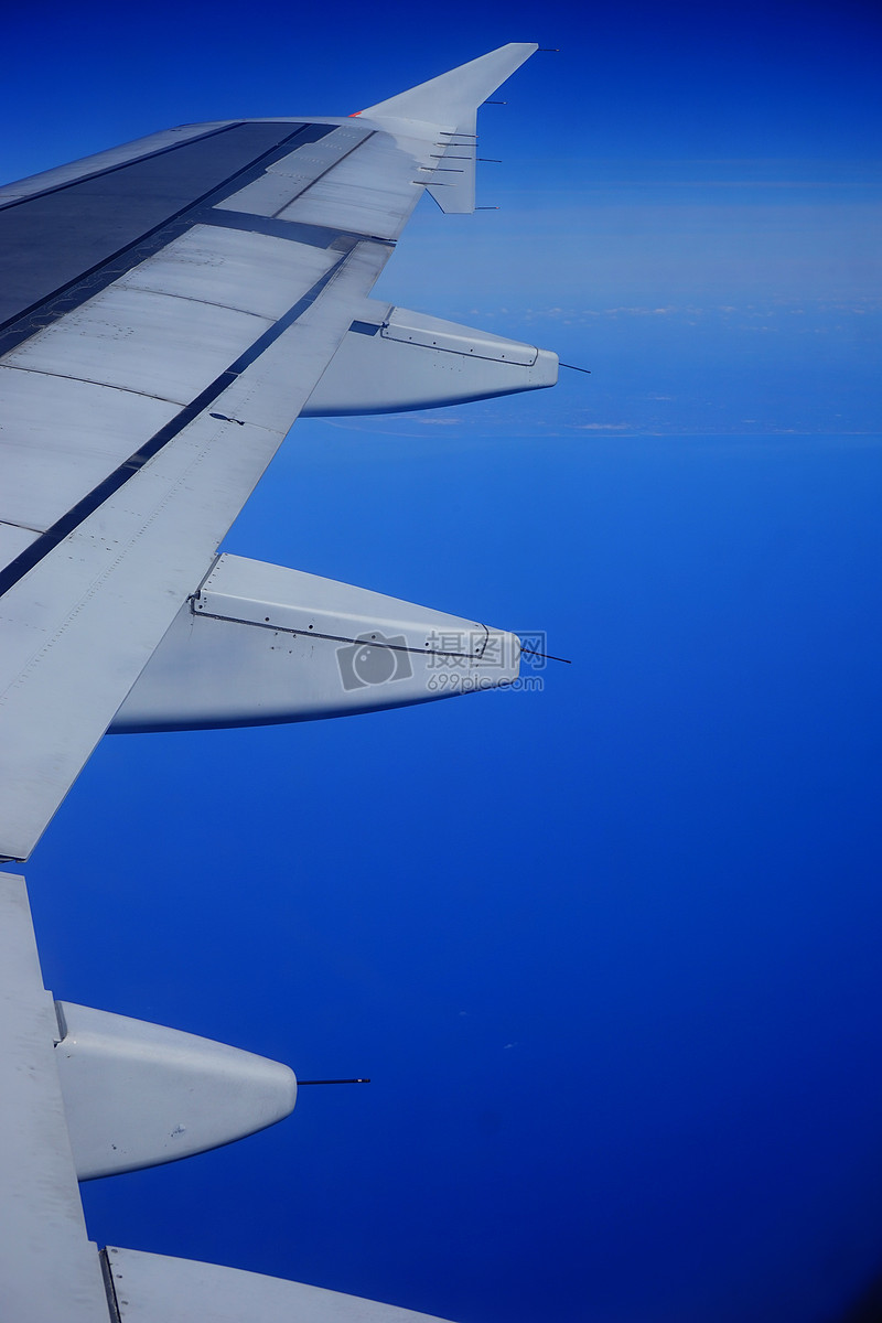 蓝天中飞机的机翼摄影图片照片免费下载,正版图片编号445582,搜索图片