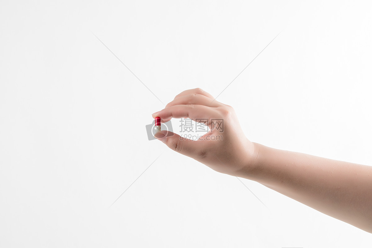 照片 人物情感 手拿药丸胶囊.