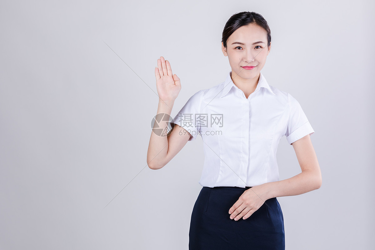 商务女士欢迎动作图片