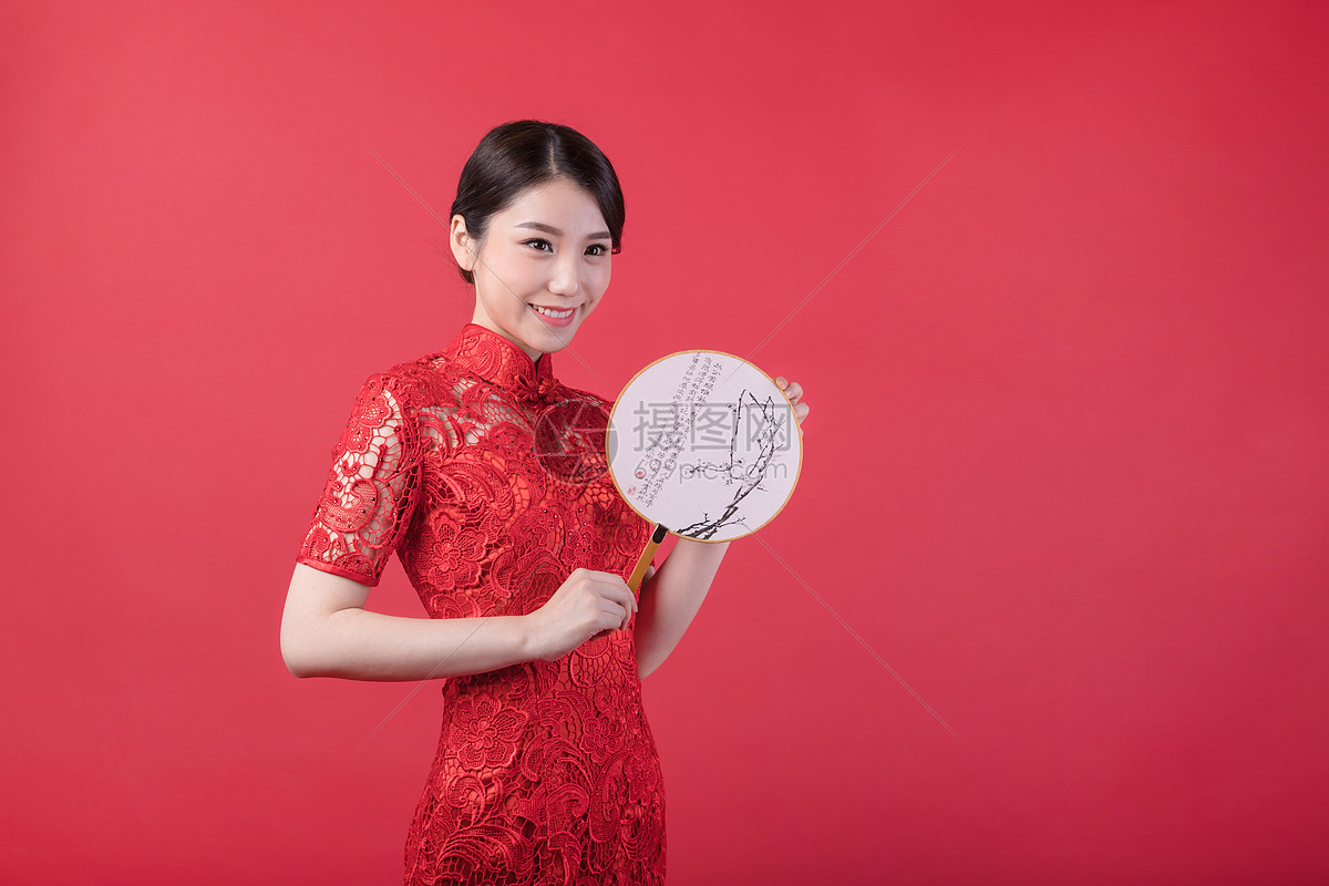 照片 人物情感 欧美模特 新春手持团扇的东方美女.jpg