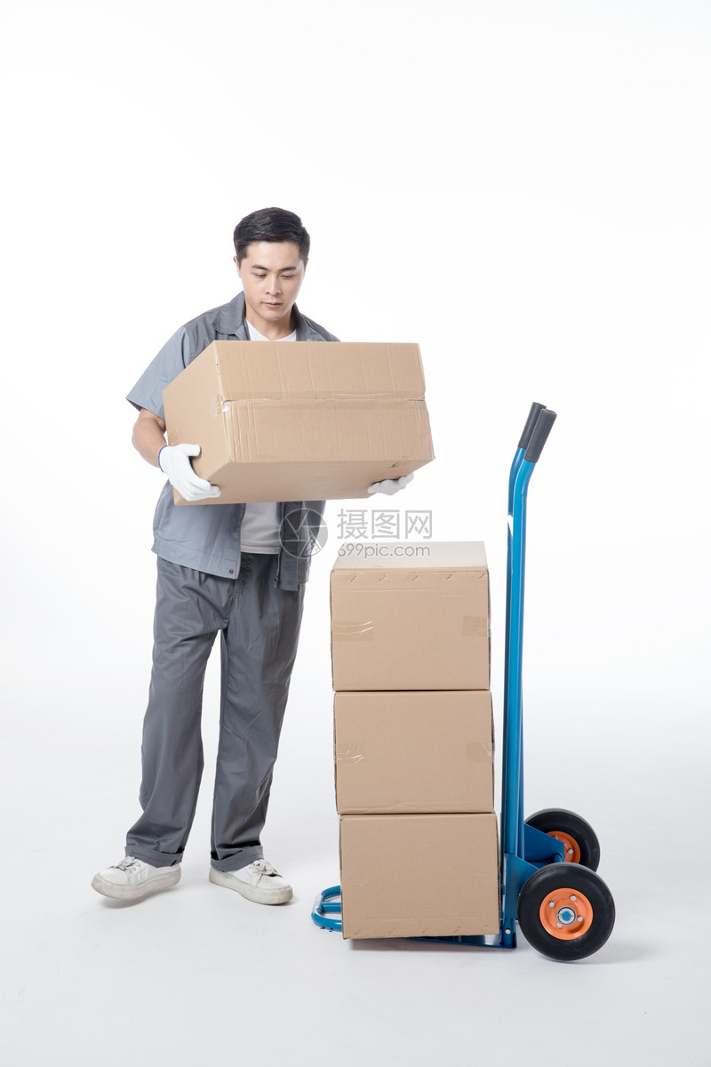 照片 人物情感 仓储物流工人搬运货物.jpg