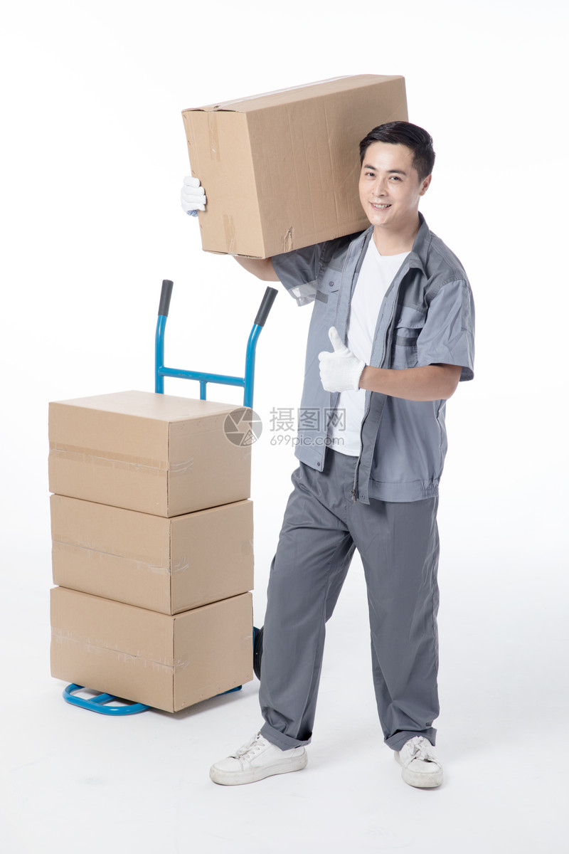 照片 人物情感 仓储物流工人搬运货物.jpg