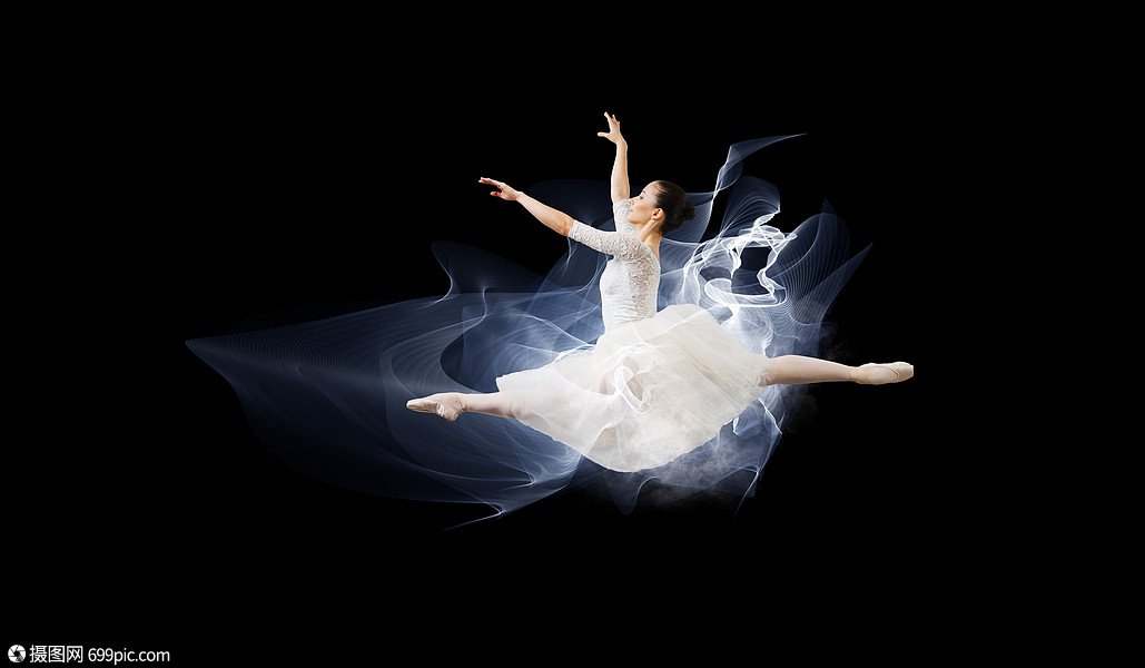 优雅的女舞者穿着白色的连衣裙,黑暗的背景下跳芭蕾的舞者艺术时尚