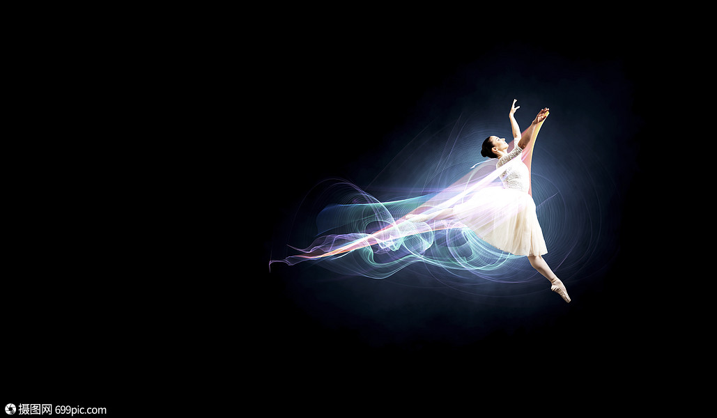 优雅的女舞者穿着白色的连衣裙,黑暗的背景下跳芭蕾的舞者美女艺术家