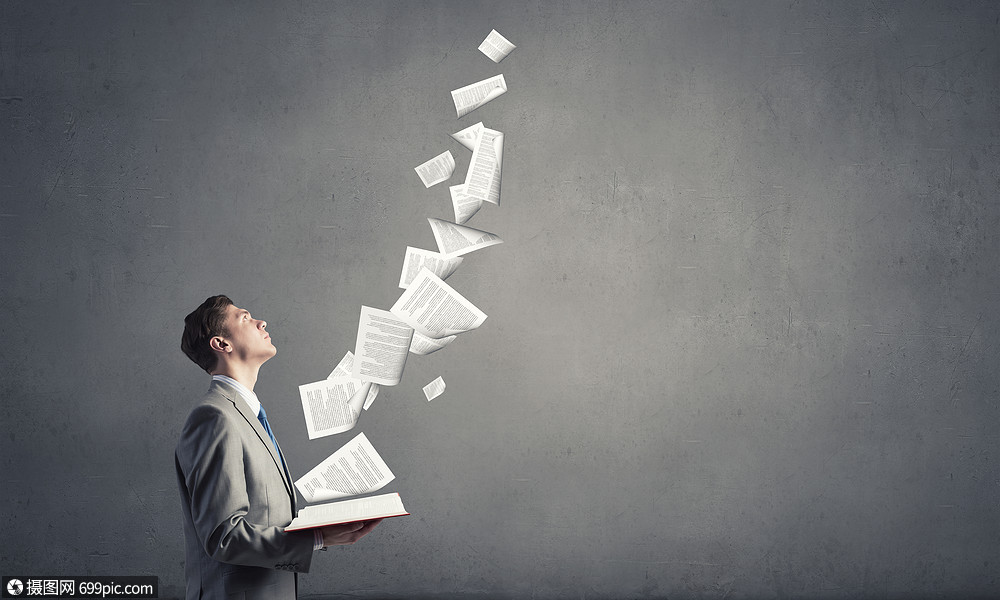 书的商人轻的商人,手里着打开的书,书页空中飞舞学生家伙