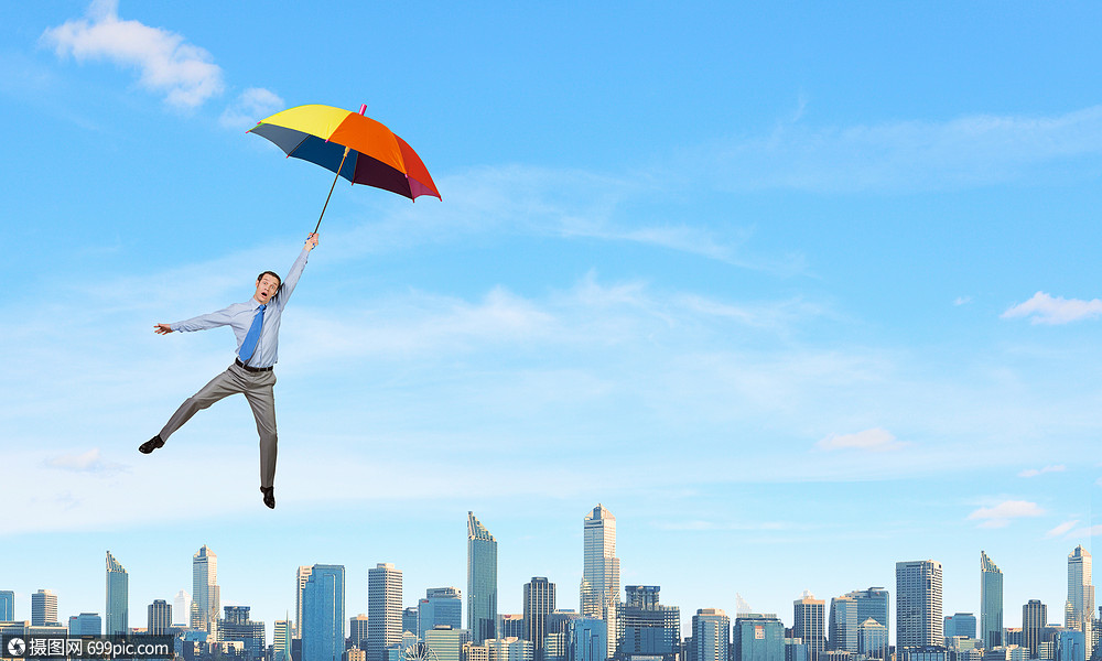 人伞上飞翔轻的商人伞上高高地飞翔