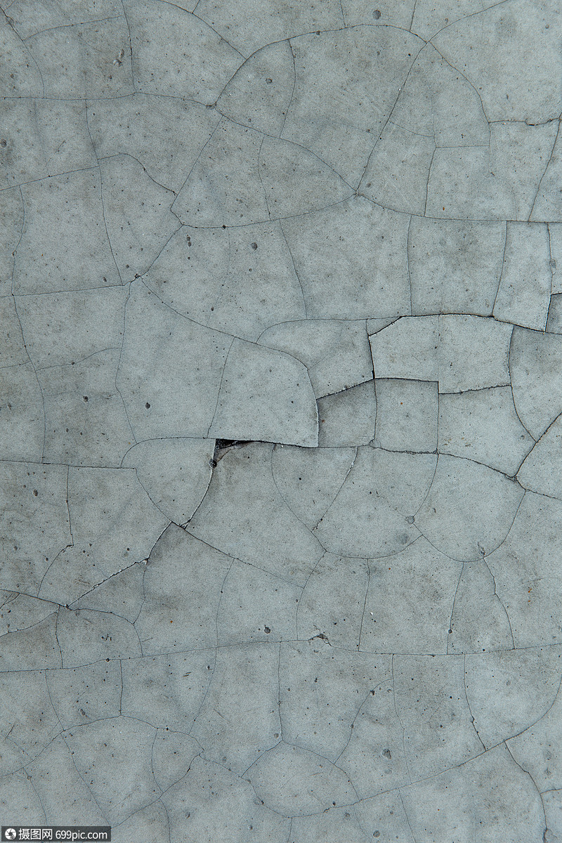 背景纹理开裂的灰色混凝土墙开裂的灰色混凝土墙纹理凌乱城市的