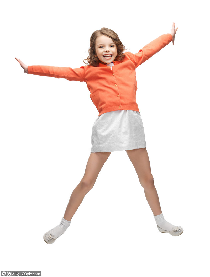 穿着休闲衣服的漂亮跳跃女孩的照片