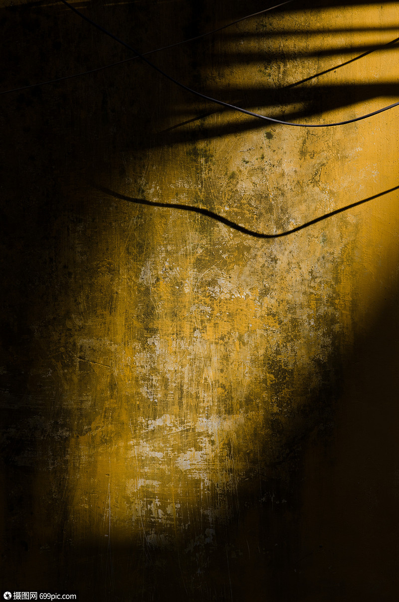 黄色的墙老旧光影图片
