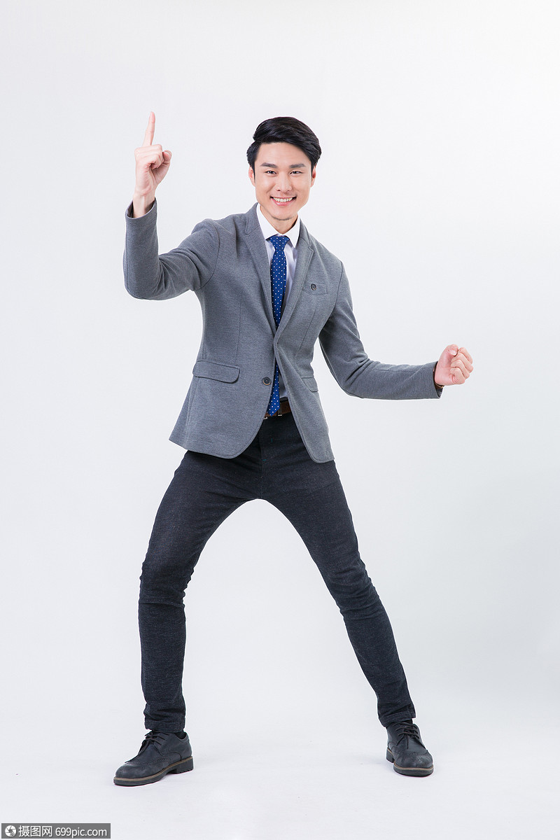 商务白领男士胜利手势动作棚拍
