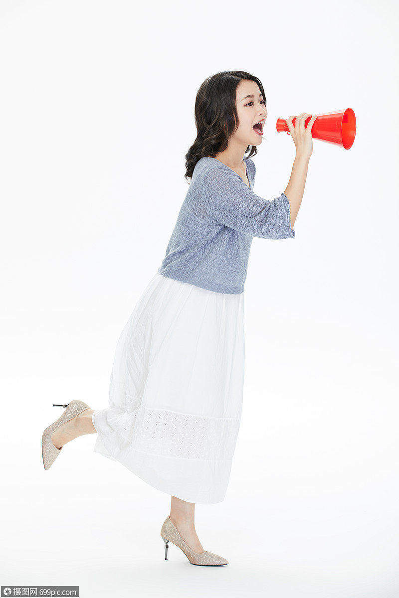年轻女性拿喇叭喊话美女亚洲人