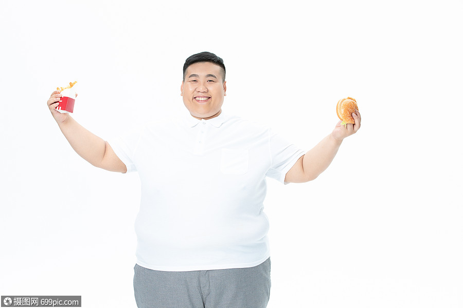 青年肥胖男性吃汉堡和薯条中国人东方人