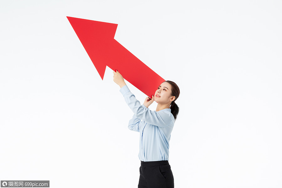 照片 职业形象 青年商务女性拿着箭头上升.jpg