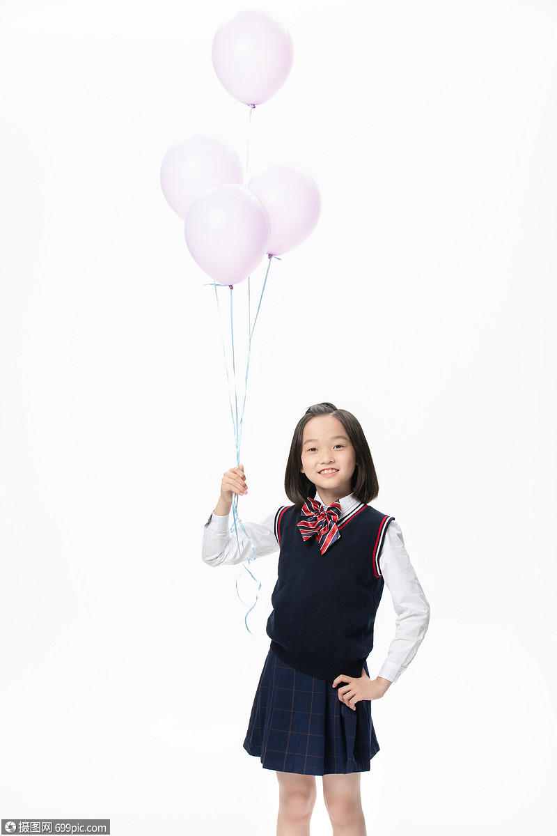 照片 职业形象 穿校服小学生手拿气球.jpg